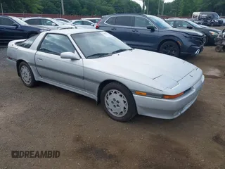 1989 Toyota Supra with VIN JT2MA71J7K0115608, listed as a IAAI auction lot 42607214 with 285,945 mi miles and . Bid and sale history available at DreamBid. Image 1.