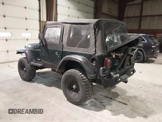 1999 Jeep Wrangler SE with VIN 1J4FY29P4XP457291, listed as a IAAI auction lot 41549758 with 133,362 mi miles and . Bid and sale history available at DreamBid. Image 3.