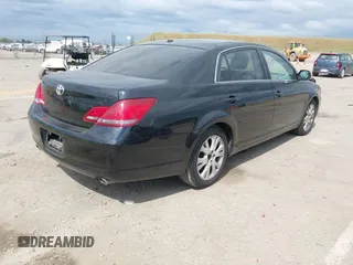 2009 Toyota Avalon XL with VIN 4T1BK36B79U327316, listed as a IAAI auction lot 42130918 with 184,948 mi miles. Bid and sale history available at carsss.com. Image 4.