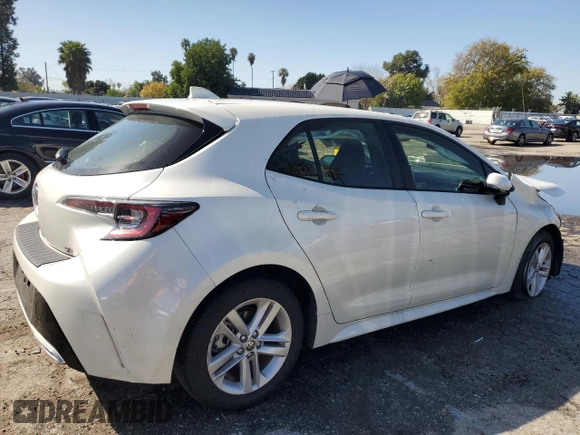 2019 Toyota Corolla Hatchback SE with VIN JTNK4RBE8K3045968, listed as a Copart auction lot 46099464 with 13,802 mi miles and Salvage Title. Bid and sale history available at carsss.com. Image 3.