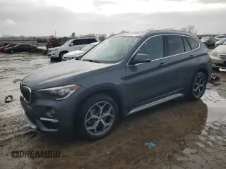 2019 BMW X1 xDrive28i z VIN WBXHT3C58K5L97890, wystawiony jako Copart lot #47076465 z przebiegiem 73 400 mil mil oraz Szkoda całkowita • Salvage title. Historia ofert i sprzedaży dostępna na DreamBid. Obrazek 1.
