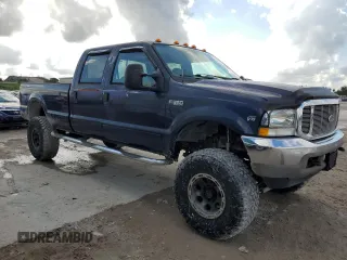 2002 Ford F-350 XL with VIN 1FTSW31S12EC95592, listed as a Copart auction lot 87092644 with 212,043 mi miles and Clean title. Bid and sale history available at DreamBid. Image 4.