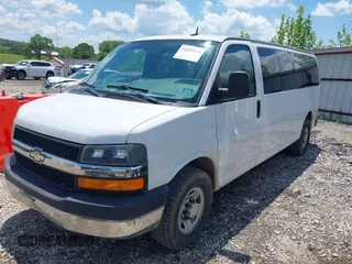 2013 Chevrolet Express Passenger LT with VIN 1GAZG1FG2D1172293, listed as a IAAI auction lot 42207624 with 250,537 mi miles and . Bid and sale history available at DreamBid. Image 2.