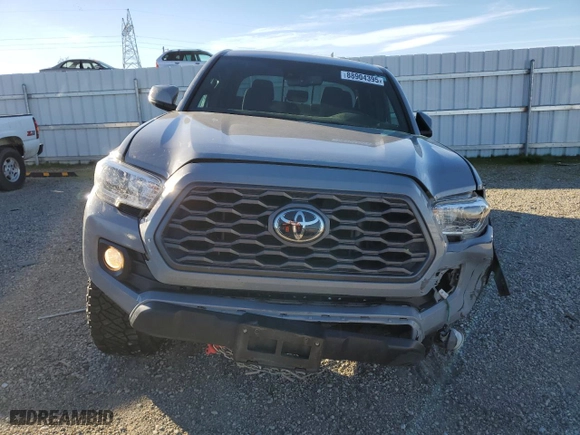 2021 Toyota Tacoma 4WD SR with VIN 3TMCZ5AN0MM387047, listed as a Copart auction lot 88904395 with 71,619 mi miles and Salvage Title. Bid and sale history available at carsss.com. Image 5.
