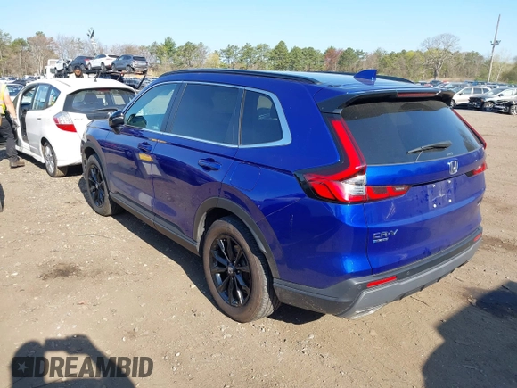 2023 Honda CR-V Sport Touring with VIN 5J6RS6H96PL001826, listed as a IAAI auction lot 42098381 with 13,813 mi miles and . Bid and sale history available at DreamBid. Image 3.