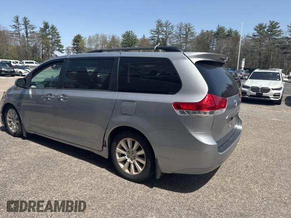 2011 Toyota Sienna XLE with VIN 5TDDK3DC3BS007297, listed as a IAAI auction lot 42158709 with 208,274 mi miles and . Bid and sale history available at DreamBid. Image 3.