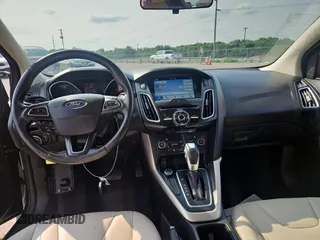 2017 Ford Focus Titanium with VIN 1FADP3N22HL279489, listed as a Copart auction lot 60740945 with 111,654 mi miles and Clean title. Bid and sale history available at DreamBid. Image 9.