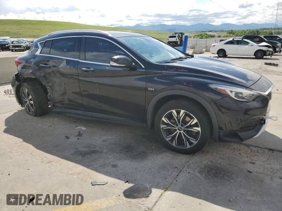2018 Infiniti QX30 Premium with VIN SJKCH5CR2JA050226, listed as a Copart auction lot 58978595 with 82,280 mi miles and Salvage title. Bid and sale history available at DreamBid. Image 4.