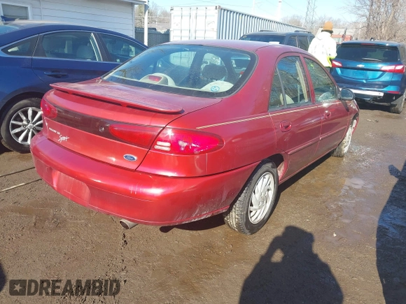 1999 Ford Escort SE z VIN 1FAFP13P6XW180845, wystawiony jako IAAI lot #41398242 z przebiegiem 59 300 mil mil oraz . Historia ofert i sprzedaży dostępna na DreamBid. Obrazek 4.