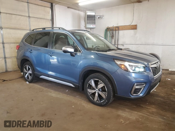 2021 Subaru Forester Touring z VIN JF2SKAXC9MH517699, wystawiony jako Copart lot #58962835 z przebiegiem 60 984 mil mil oraz Szkoda całkowita • Salvage title. Historia ofert i sprzedaży dostępna na DreamBid. Obrazek 4.