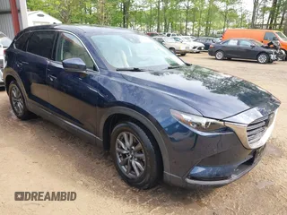 2021 Mazda CX-9 Touring with VIN JM3TCBCY8M0541991, listed as a IAAI auction lot 42112592 with 53,880 mi miles and . Bid and sale history available at DreamBid. Image 1.