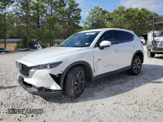 2023 Mazda CX-5 2.5 S Premium Package with VIN JM3KFBDM4P0217729, listed as a Copart auction lot 85883354 with 18,116 mi miles and Salvage Title. Bid and sale history available at carsss.com. Image 1.