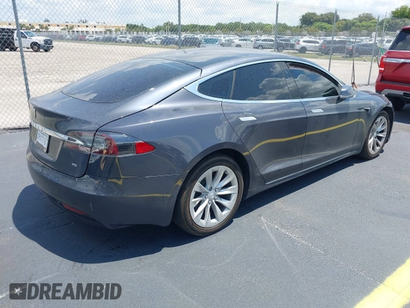 2017 Tesla Model S 60 с VIN 5YJSA1E10HF220006, выставлен на аукционе IAAI как лот 42190629 с пробегом 64 350 миль миль и . История ставок и продаж доступна на DreamBid. Изображение 4.