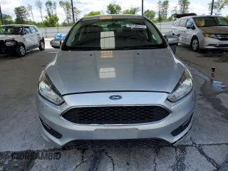 2016 Ford Focus SE z VIN 1FADP3F29GL268308, wystawiony jako Copart lot #56738415 z przebiegiem 111 702 mil mil oraz Szkoda całkowita • Salvage title. Historia ofert i sprzedaży dostępna na DreamBid. Obrazek 5.