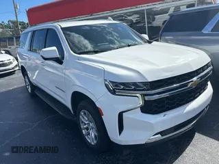 2021 Chevrolet Suburban LS with VIN 1GNSCBKD7MR301059, listed as a Copart auction lot 77436554 with 54,279 mi miles and Clean Title. Bid and sale history available at DreamBid. Image 1.
