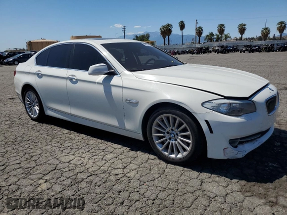 2013 BMW 5 Series 535i with VIN WBAFR7C56DC823291, listed as a Copart auction lot 56621415 with 100,423 mi miles and Salvage title. Bid and sale history available at DreamBid. Image 4.