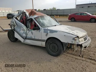 1990 Plymouth Sundance z VIN 1P3XP48K4LN160672, wystawiony jako Copart lot #71204364 z przebiegiem 81 706 mil mil oraz Szkody całkowita. Historia ofert i sprzedaży dostępna na DreamBid. Obrazek 4.