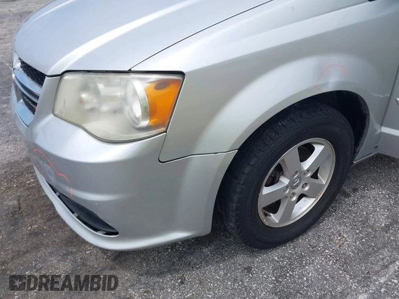 2012 Dodge Grand Caravan SXT with VIN 2C4RDGCG3CR308173, listed as a IAAI auction lot 42255879 with 96,489 mi miles and . Bid and sale history available at DreamBid. Image 6.