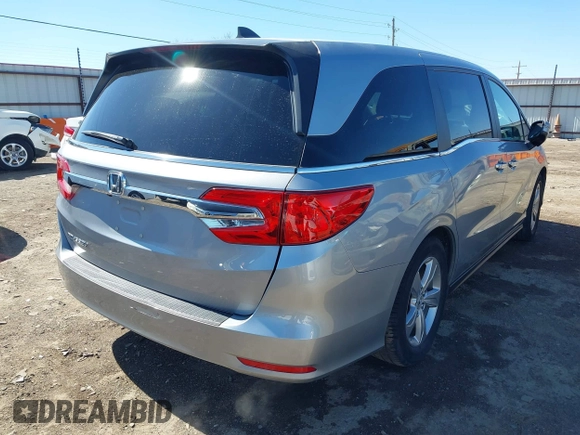 2018 Honda Odyssey EX-L with VIN 5FNRL6H71JB077112, listed as a IAAI auction lot 41721523 with 70,893 mi miles. Bid and sale history available at carsss.com. Image 4.