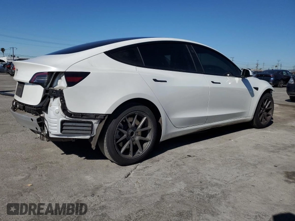 2022 Tesla Model 3 with VIN 5YJ3E1EA3NF125895, listed as a Copart auction lot 50042005 with 47,181 mi miles and Salvage Title. Bid and sale history available at DreamBid. Image 3.