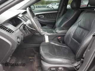 2015 Ford Taurus SEL with VIN 1FAHP2E92FG168293, listed as a Copart auction lot 52775625 with 207,447 mi miles and Salvage title. Bid and sale history available at DreamBid. Image 7.