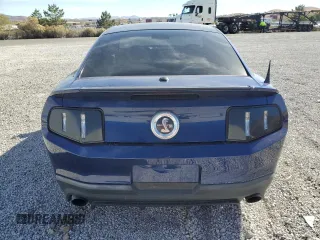 2010 Ford Mustang GT500 with VIN 1ZVBP8JS1A5105926, listed as a Copart auction lot 77398504 with 63,699 mi miles and Salvage title. Bid and sale history available at DreamBid. Image 6.