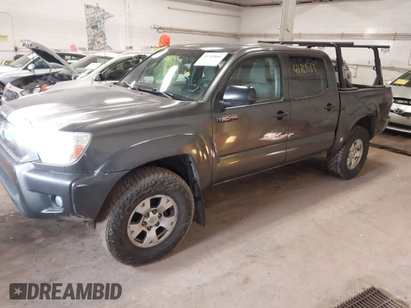 2014 Toyota Tacoma with VIN 3TMLU4EN3EM151917, listed as a IAAI auction lot 41769083 with 216,910 mi miles. Bid and sale history available at carsss.com. Image 2.
