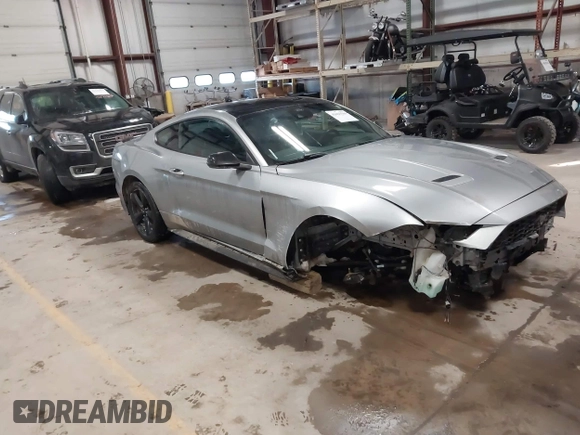 2021 Ford Mustang EcoBoost with VIN 1FA6P8TH1M5127800, listed as a IAAI auction lot 41625544 with 82,531 mi miles. Bid and sale history available at carsss.com. Image 1.