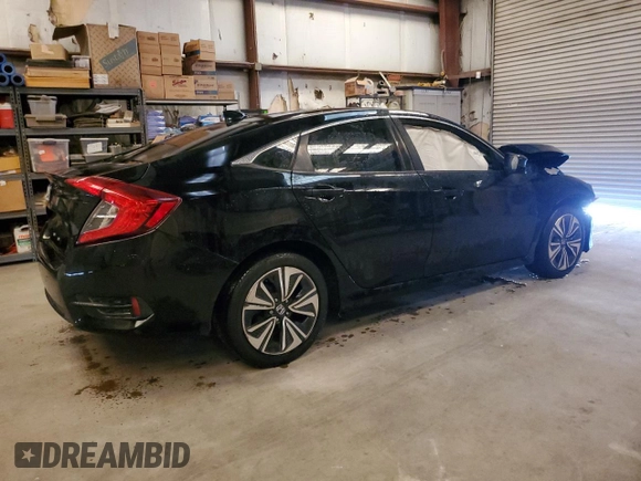 2017 Honda Civic Sedan EX-L with VIN 2HGFC1F75HH650589, listed as a Copart auction lot 77036554 with 130,080 mi miles and Clean Title. Bid and sale history available at carsss.com. Image 3.