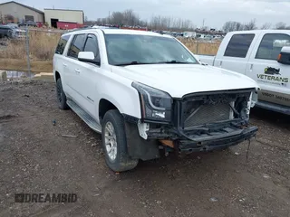 2015 GMC Yukon XL SLE with VIN 1GKS2GKC5FR170544, listed as a IAAI auction lot 41716526 with 156,673 mi miles and . Bid and sale history available at DreamBid. Image 1.