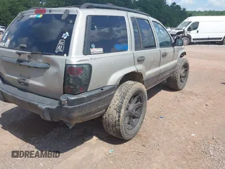 2004 Jeep Grand Cherokee Laredo with VIN 1J4GW48S34C354006, listed as a IAAI auction lot 42599812 with 258,004 mi miles and . Bid and sale history available at DreamBid. Image 4.