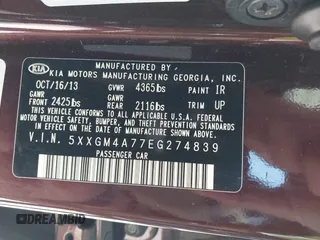 2014 Kia Optima LX with VIN 5XXGM4A77EG274839, listed as a IAAI auction lot 41976091 with 130,517 mi miles. Bid and sale history available at carsss.com. Image 9.