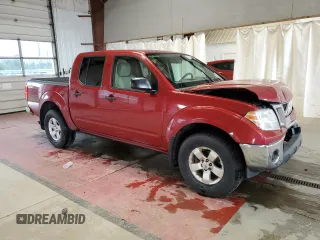 2011 Nissan Frontier Pro-4X with VIN 1N6AD0EV2BC400945, listed as a Copart auction lot 58693635 with 122,209 mi miles and Salvage title. Bid and sale history available at DreamBid. Image 4.