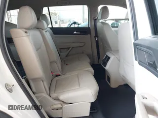 2018 Volkswagen Atlas SE with VIN 1V2CR2CAXJC594811, listed as a IAAI auction lot 42408595 with 65,247 mi miles and . Bid and sale history available at DreamBid. Image 8.
