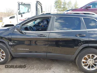 2020 Jeep Cherokee Latitude Plus with VIN 1C4PJMLB0LD591217, listed as a IAAI auction lot 41857544 with 102,704 mi miles and . Bid and sale history available at DreamBid. Image 14.