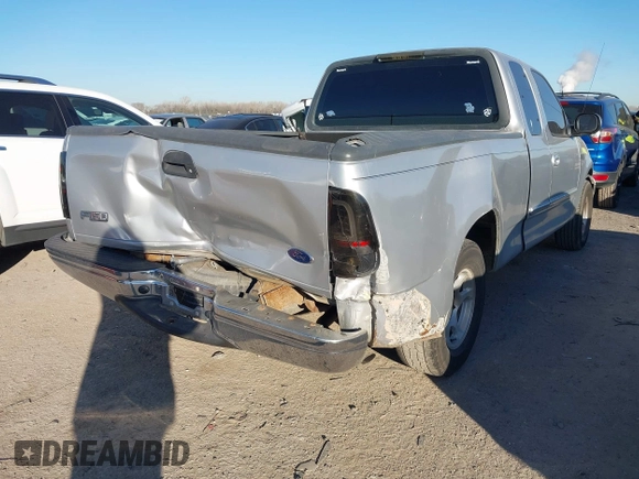 1999 Ford F-150 with VIN 1FTZX1729XKA58767, listed as a IAAI auction lot 41392815 with 342,029 mi miles and . Bid and sale history available at DreamBid. Image 6.