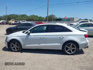 2015 Audi A3 Premium z VIN WAUACGFF2F1011596, wystawiony jako IAAI lot #42147488 z przebiegiem 87 910 mil mil oraz . Historia ofert i sprzedaży dostępna na DreamBid. Obrazek 14.