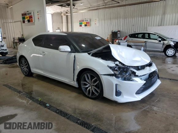 2016 Scion tC z VIN JTKJF5C73GJ024430, wystawiony jako Copart lot #59889055 z przebiegiem 142 532 mil mil oraz Szkoda całkowita • Salvage title. Historia ofert i sprzedaży dostępna na DreamBid. Obrazek 4.
