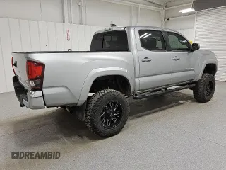 2020 Toyota Tacoma SR5 z VIN 5TFAZ5CN9LX089772, wystawiony jako Copart lot #60783225 z przebiegiem 59 592 mil mil oraz Czysty tytuł • Clean title. Historia ofert i sprzedaży dostępna na DreamBid. Obrazek 3.
