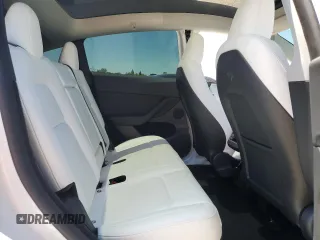 2024 Tesla Model Y Long Range with VIN 7SAYGDEE4RF054753, listed as a Copart auction lot 57989375 with 21,394 mi miles and Salvage title. Bid and sale history available at DreamBid. Image 10.