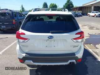2022 Subaru Forester Touring with VIN JF2SKARC9NH445126, listed as a IAAI auction lot 42350111 with 61,998 mi miles and . Bid and sale history available at DreamBid. Image 17.