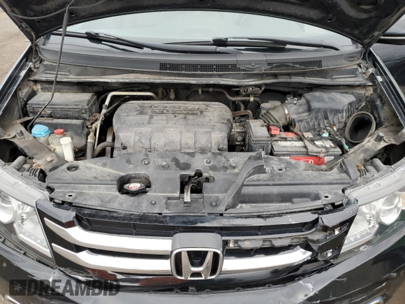 2015 Honda Odyssey Touring Elite with VIN 5FNRL5H91FB504095, listed as a Copart auction lot 53868125 with 176,272 mi miles and Salvage Title. Bid and sale history available at DreamBid. Image 12.