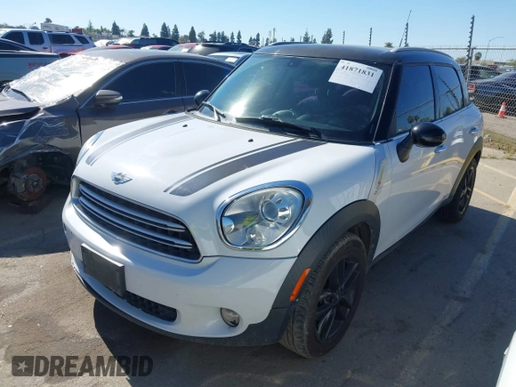 2015 MINI Countryman with VIN WMWZB3C51FWR45357, listed as a IAAI auction lot 41871831 with 201,358 mi miles and . Bid and sale history available at DreamBid. Image 2.