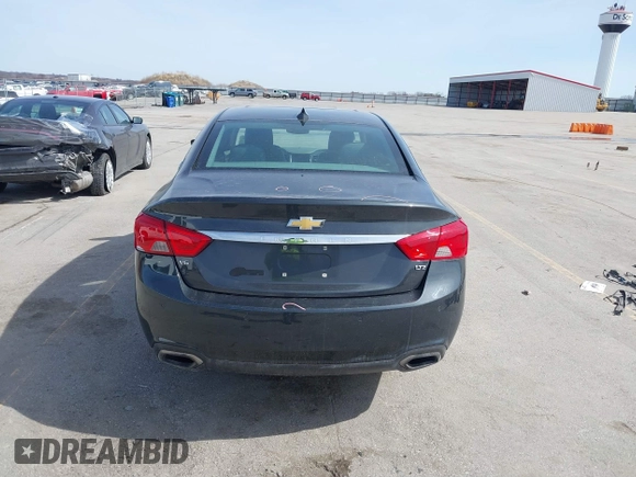 2015 Chevrolet Impala LTZ with VIN 1G1165S39FU138640, listed as a IAAI auction lot 41780288 with 145,000 mi miles and . Bid and sale history available at DreamBid. Image 19.