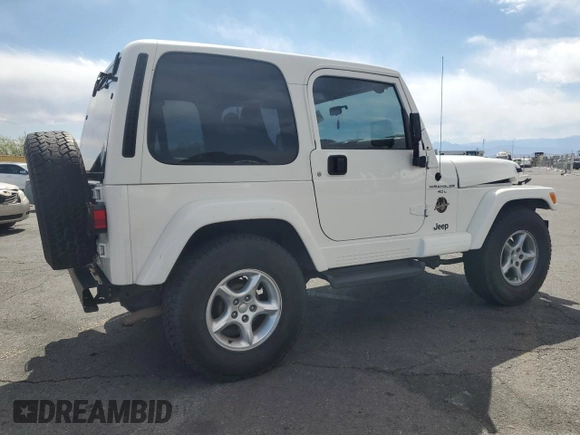 2000 Jeep Wrangler Sahara with VIN 1J4FA59S6YP790541, listed as a Copart auction lot 53837885 with 137,827 mi miles and Salvage title. Bid and sale history available at DreamBid. Image 3.