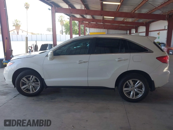 2015 Acura RDX with VIN 5J8TB4H30FL021288, listed as a IAAI auction lot 42595955 with 106,186 mi miles and . Bid and sale history available at DreamBid. Image 14.
