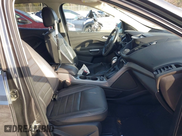 2016 Ford Escape SE with VIN 1FMCU9GX1GUC32307, listed as a IAAI auction lot 41395399 with 142,664 mi miles. Bid and sale history available at carsss.com. Image 5.