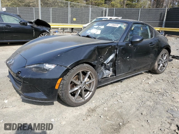 2021 Mazda MX-5 Miata Grand Touring with VIN JM1NDAM71M0451354, listed as a Copart auction lot 47756025 with 53,347 mi miles and Salvage title. Bid and sale history available at DreamBid. Image 1.