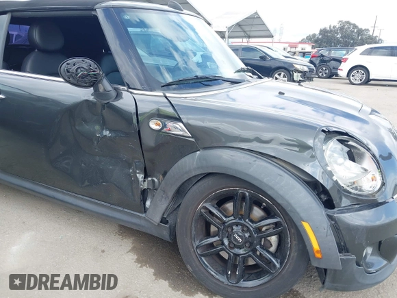 2012 MINI Convertible S with VIN WMWZP3C54CT250689, listed as a IAAI auction lot 41928624 with 126,442 mi miles and . Bid and sale history available at DreamBid. Image 6.