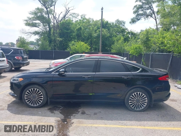 2017 Ford Fusion Titanium with VIN 3FA6P0D92HR252476, listed as a IAAI auction lot 40176942 with 88,818 mi miles and . Bid and sale history available at DreamBid. Image 14.